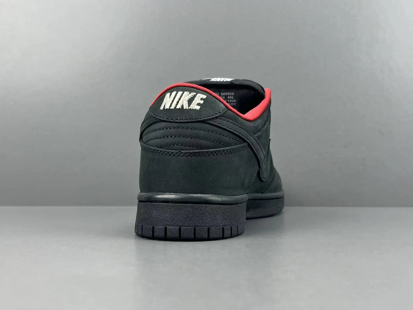 Nike SB Dunk Supreme 94 Black low top sneaker side view all black