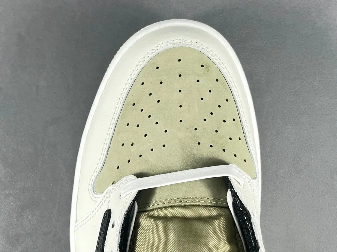 "Air Jordan 1 Low Golf x Travis Scott 'Neutral Olive' sneakers featuring olive nubuck base, off-white leather overlays, black reverse Swoosh, and Cactus Jack branding." citeturn0search0
