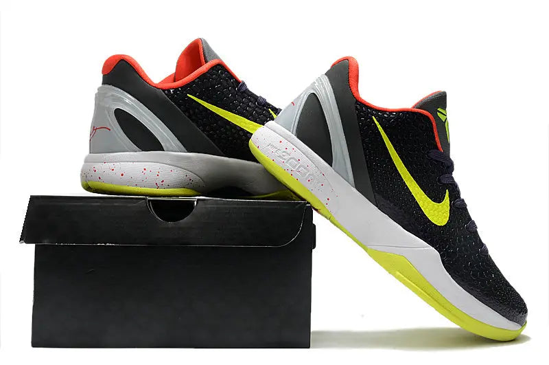 Nike Kobe 6 Supreme Chaos sneakers with bold yellow and purple low-top design.