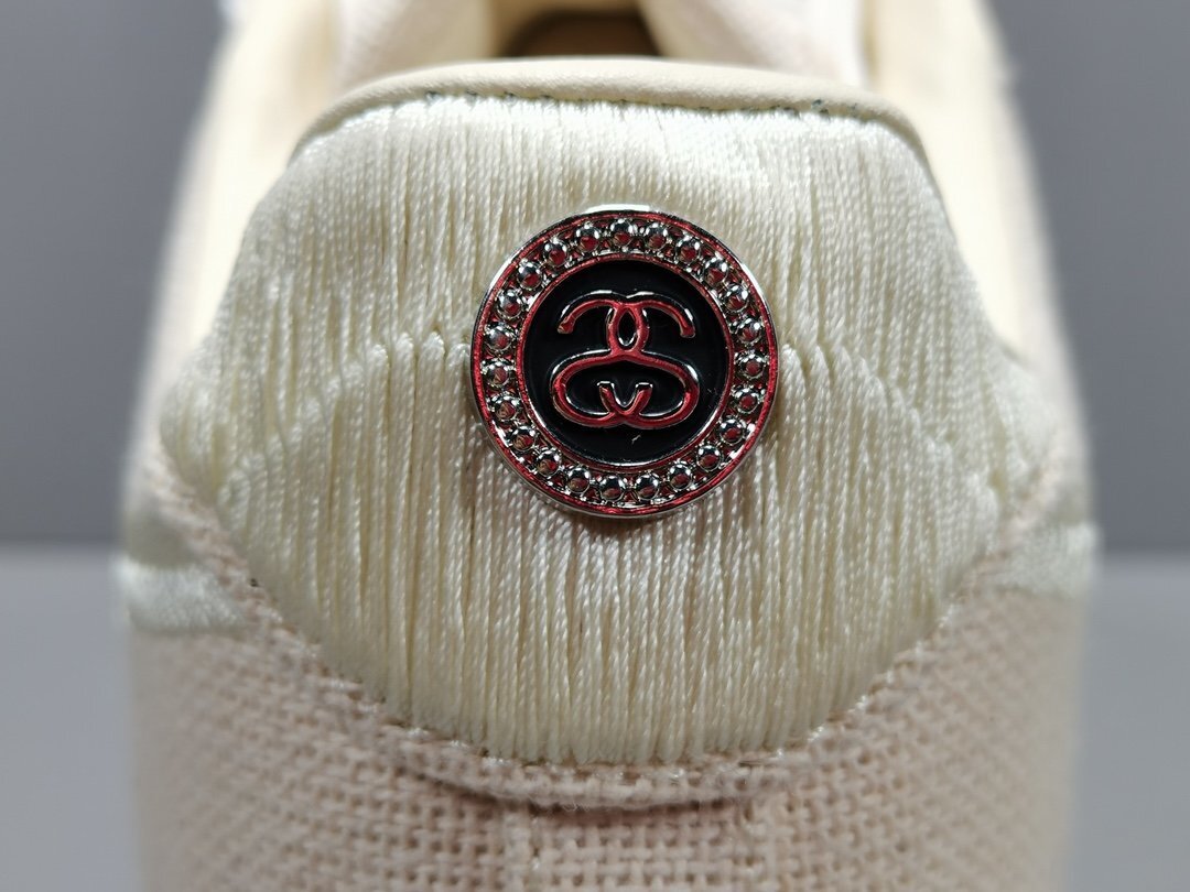 Nike Air Force 1 x Stüssy Fossil featuring textured hemp upper and minimalist branding