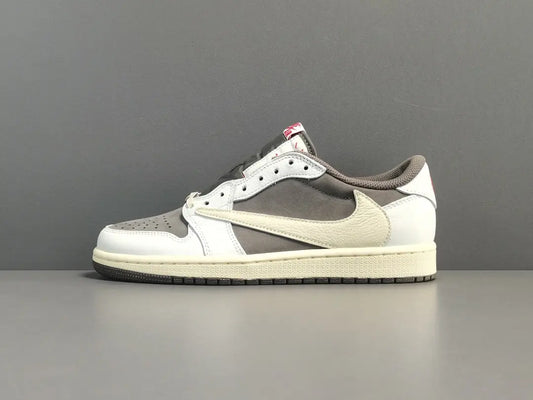 "Jordan 1 Low x Travis Scott Reverse Mocha – Mocha suede, reverse Swoosh, Cactus Jack branding, and vintage sail accents."