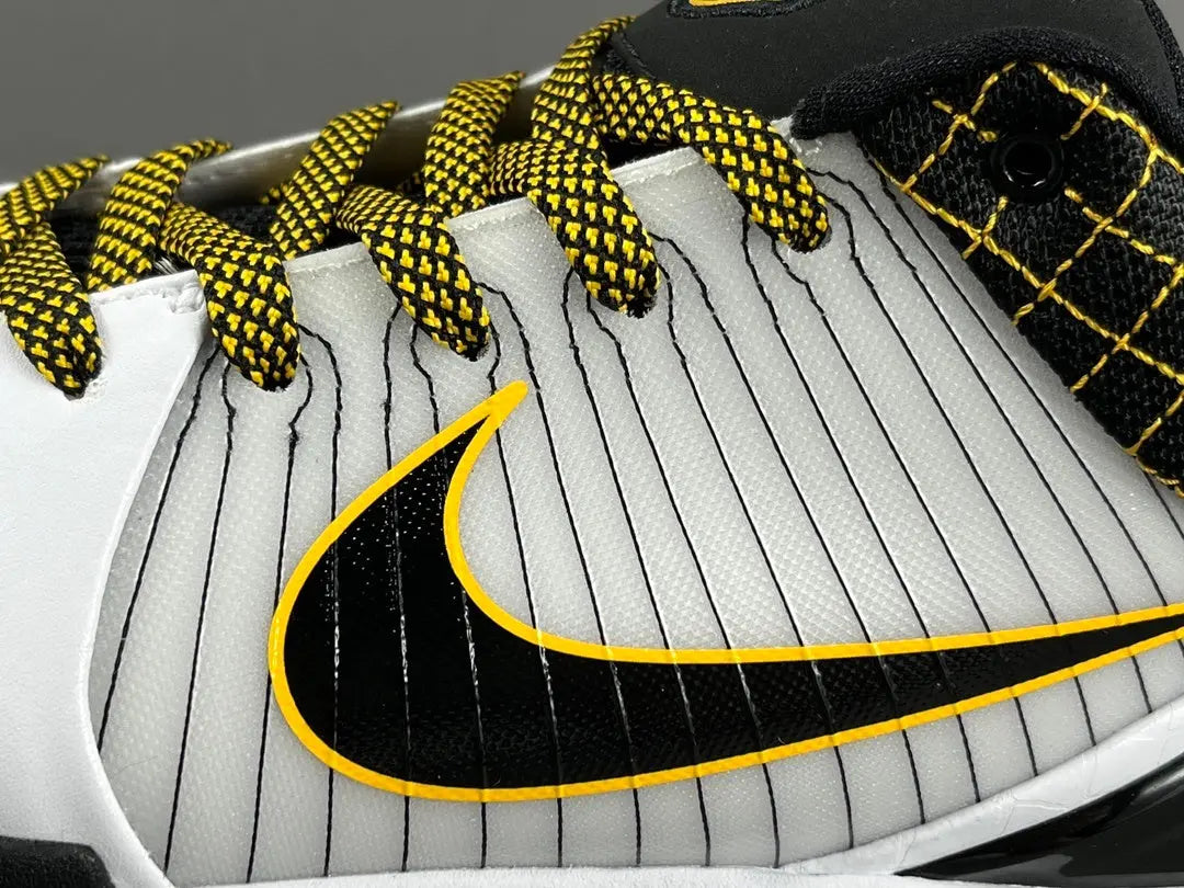 Nike Kobe 4 Protro White Black Del Sol basketball sneakers with accents