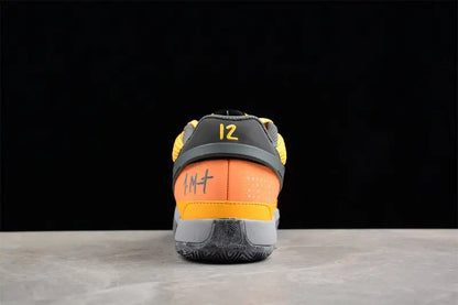 nike ja 1 x wet cement basketball shoes side view with urban grey textured colorway