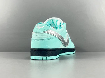 Nike SB Dunk Tiffany Lobster low top sneaker side view aqua white
