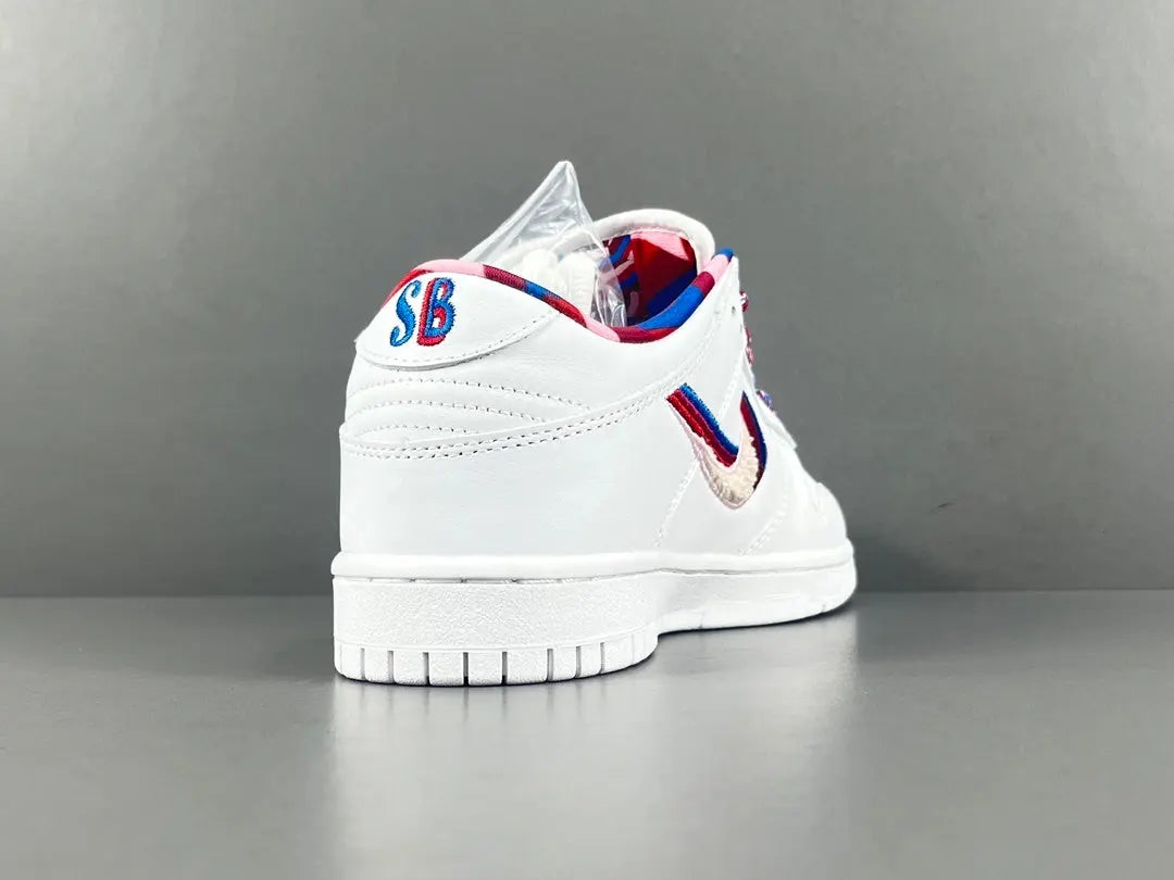 Nike SB Dunk Low Parra white sneaker with pink blue green abstract overlays limited edition skate shoe