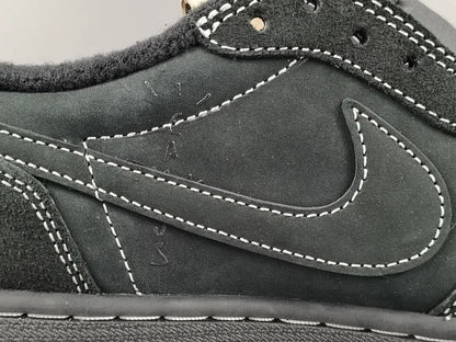 "Jordan 1 Low Travis Scott Phantom with black nubuck, white stitching, and signature reverse Swoosh."