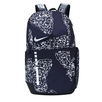 A Nike backpack in navy blue with a white cracked-glass pattern, featuring a white Nike swoosh on the front.