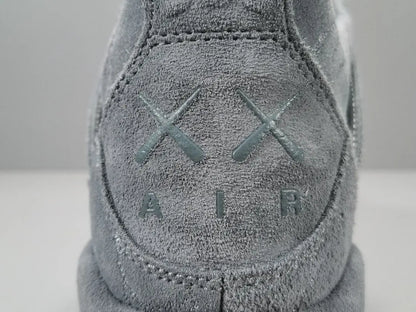 Close-up of a textured gray sneaker with 'XX Air' branding on a light background