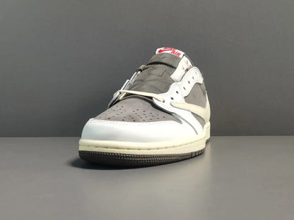"Jordan 1 Low x Travis Scott Reverse Mocha – Mocha suede, reverse Swoosh, Cactus Jack branding, and vintage sail accents."