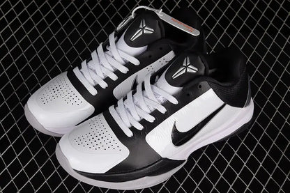 Top-down view of Nike Kobe 5 Protro White/Black featuring the embroidered Kobe Sheath logo on the tongue and lace-up closure on a predominantly white upper