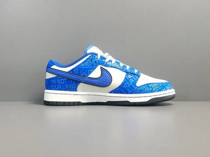 Nike Dunk Low “Jackie Robinson” sneaker with black, grey, and royal blue accents honoring the baseball legend
