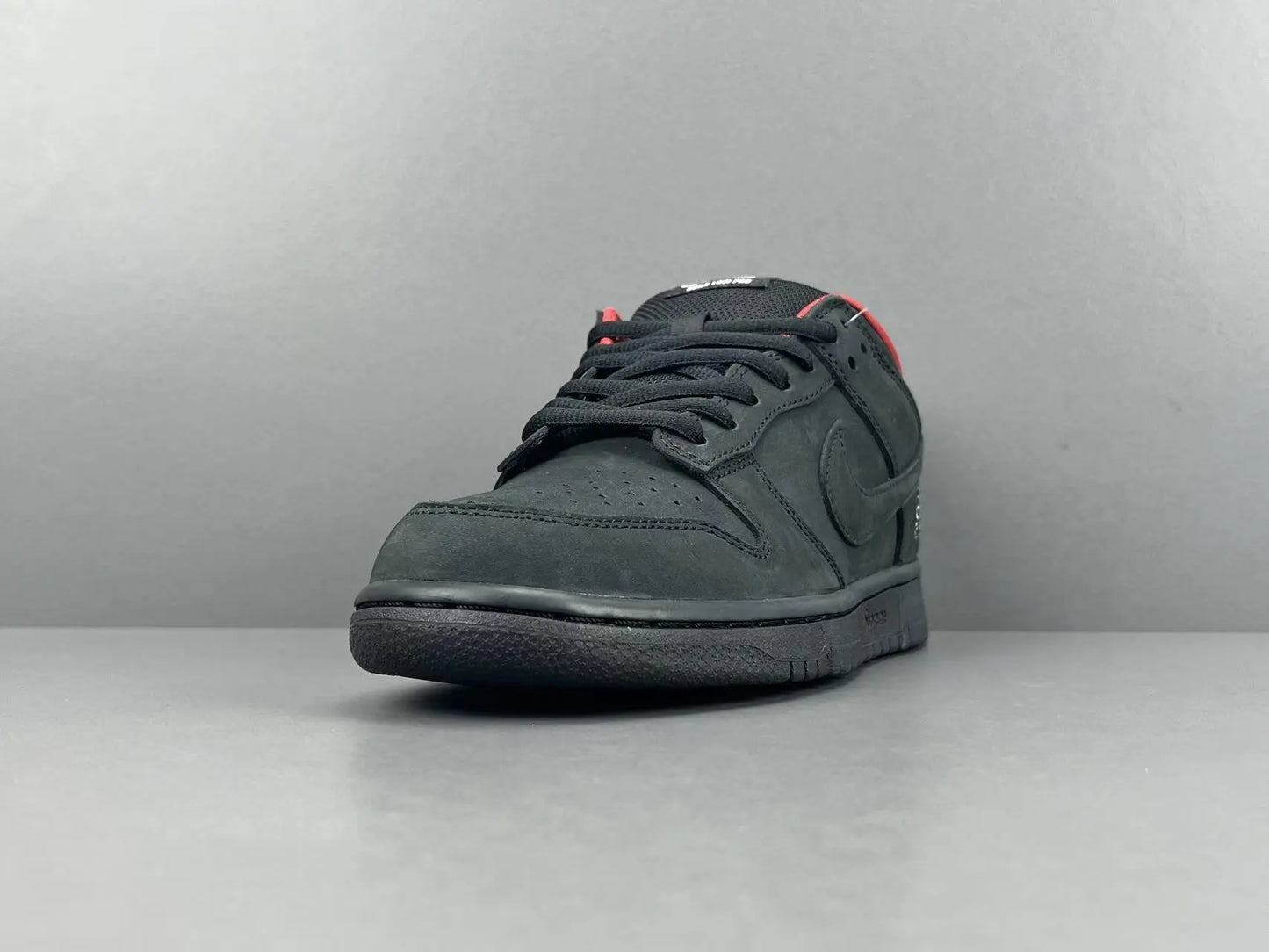 Nike SB Dunk Supreme 94 Black low top sneaker side view all black