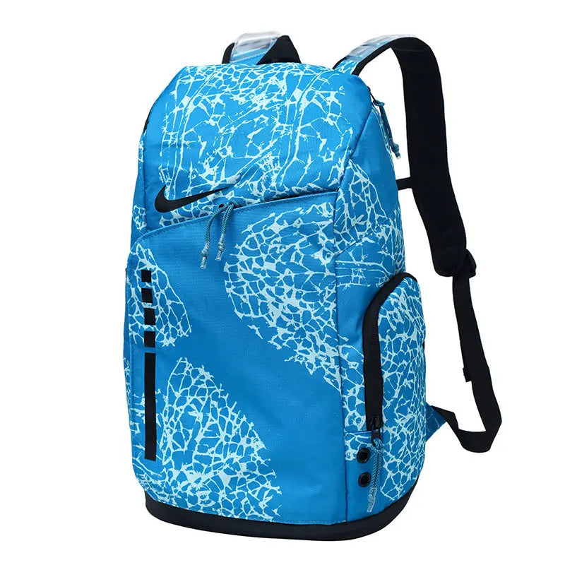 A blue and white patterned Nike backpack with black straps and trim, shown on a plain white background.