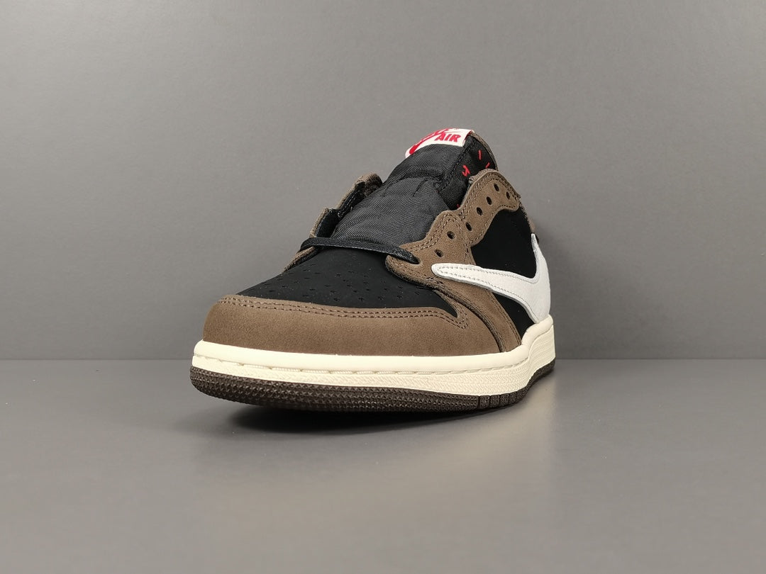 "Air Jordan 1 Low OG SP x Travis Scott sneakers featuring signature reverse Swoosh, premium materials, and Cactus Jack branding." 