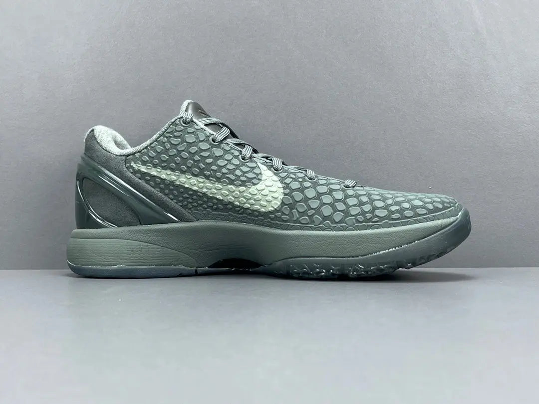 “Black and purple Nike Kobe 6 Protro sneakers with ‘Fade to Black’ design.”
