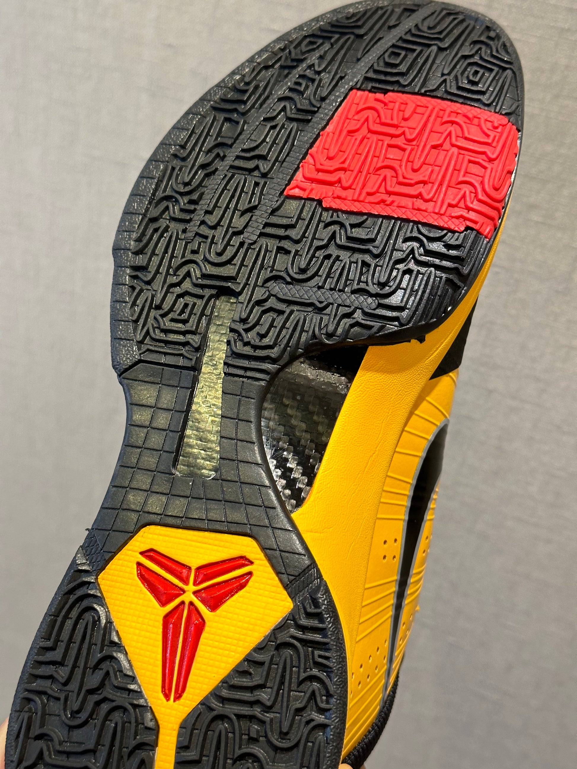 Nike Kobe 5 Protro Bruce Lee basketball shoes in yellow and black colorway

