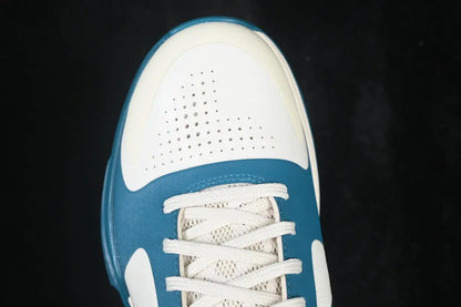 Close-up of Bright Spruce Swoosh on Nike Kobe 5 Protro Caitlin Clark Coconut Milk