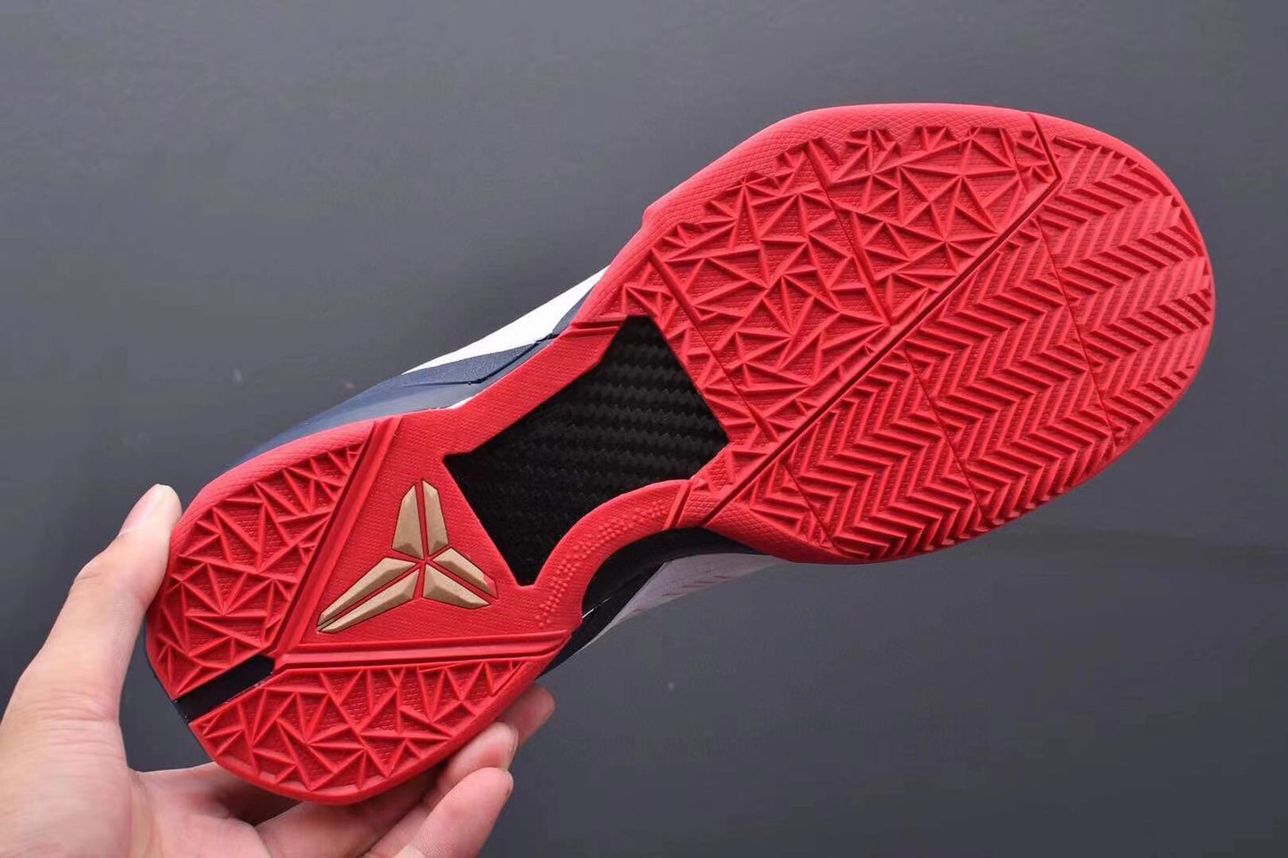 Nike Kobe 7 Gold Medal basketball shoes black with gold metallic accents
