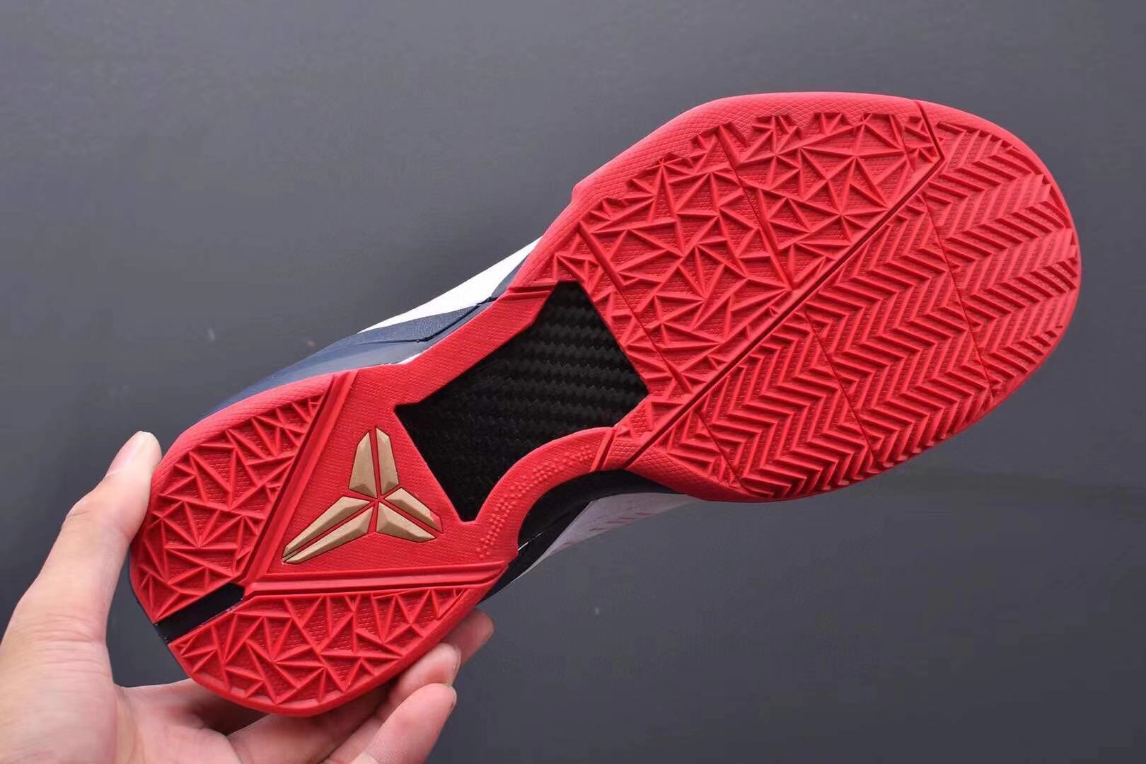 Nike Kobe 7 Gold Medal basketball shoes black with gold metallic accents
