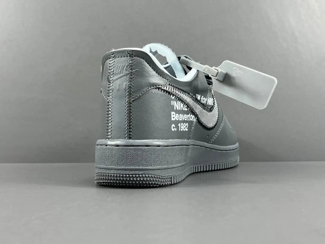 Nike Air Force 1 x Off-White custom grey sneaker with deconstructed design and zip tie
