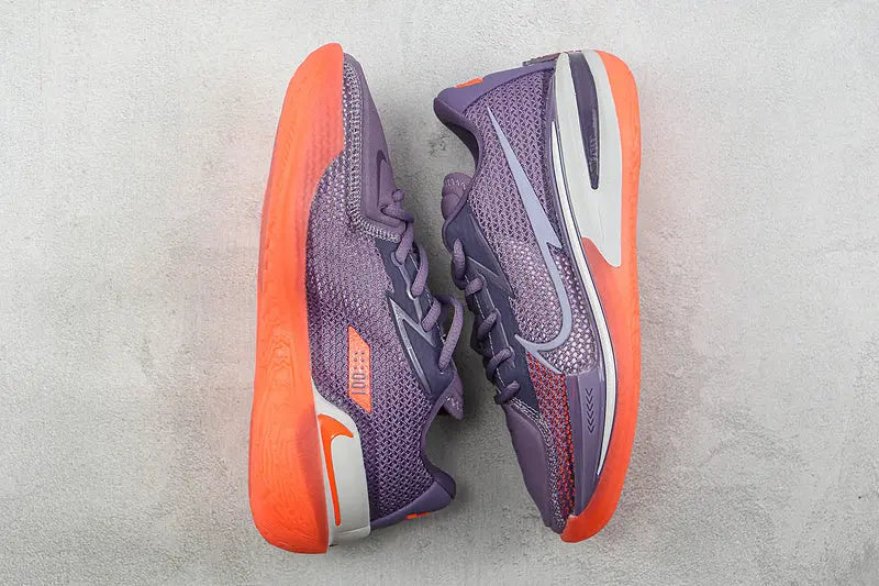 Nike Violet Crimson athletic shoes for basketball and training