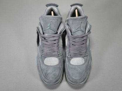 Gray high-top sneakers on a gray background