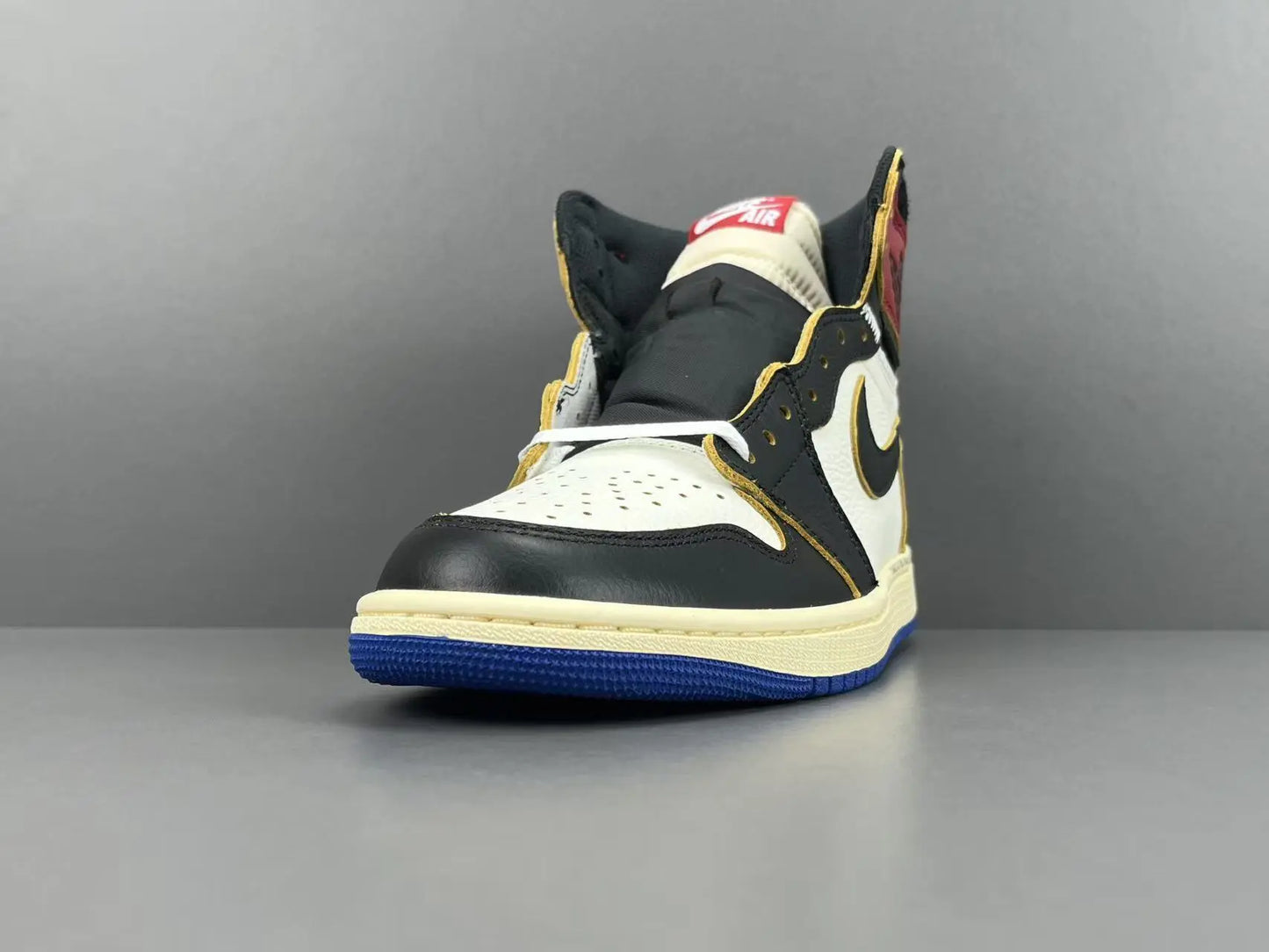Air Jordan 1 High OG Fragment Union LA side view white navy leather sneaker