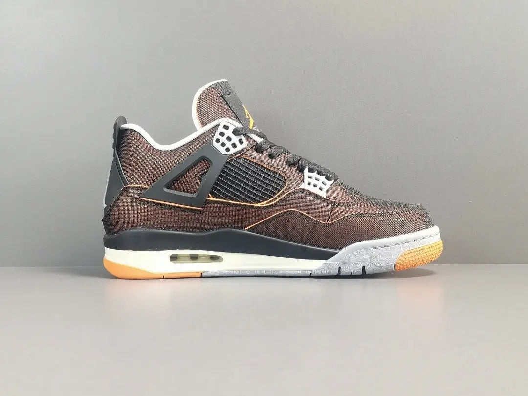 Brown sneaker with black and white accents on a gray background
