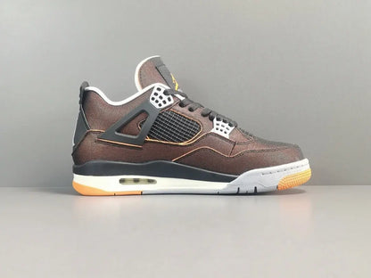 Brown sneaker with black and white accents on a gray background