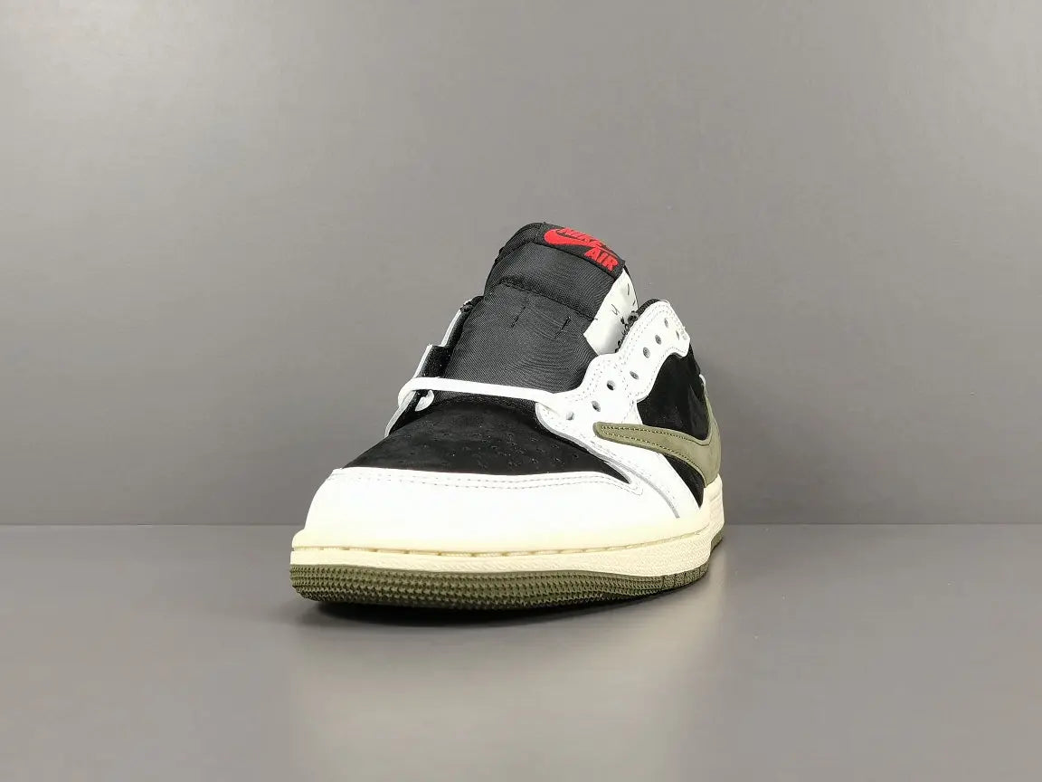 "Jordan 1 Low x Travis Scott Olive with olive suede, black leather overlays, reverse Swoosh, and Cactus Jack branding."