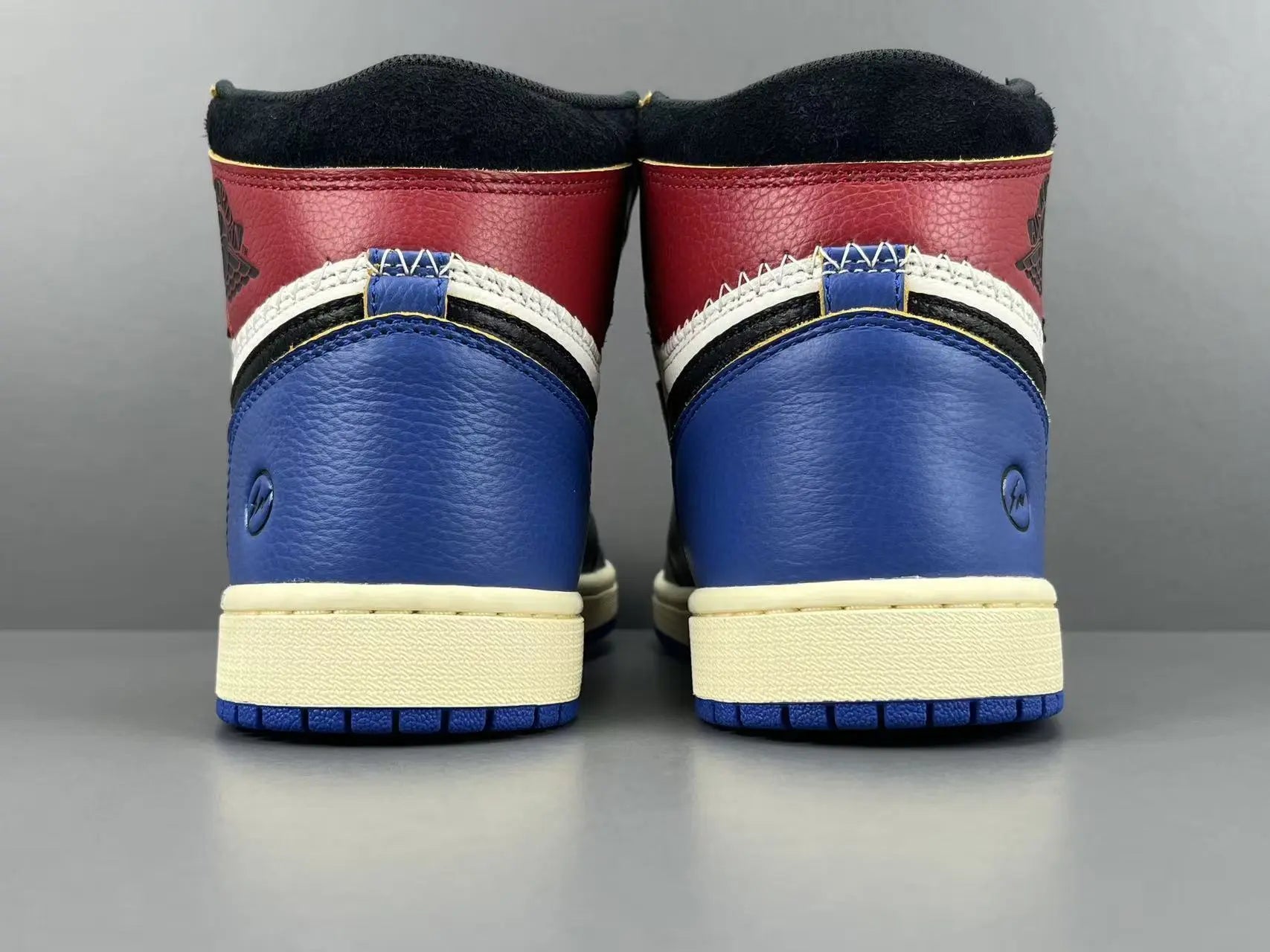 Air Jordan 1 High OG Fragment Union LA side view white navy leather sneaker