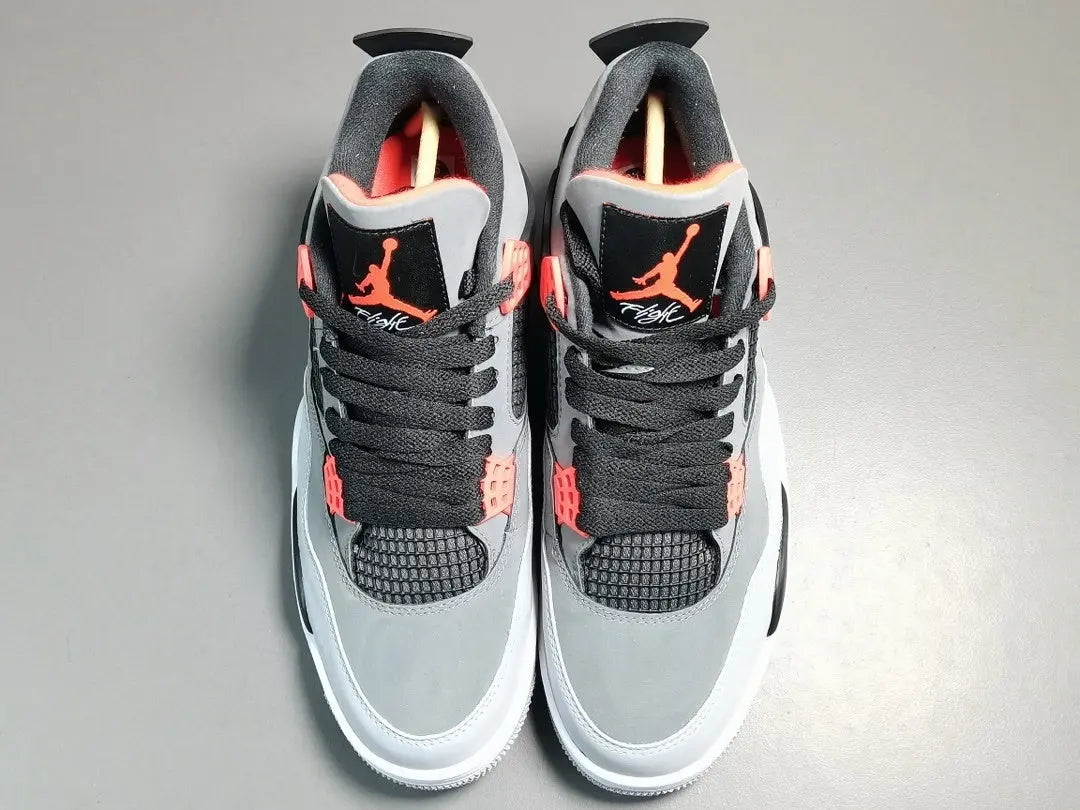 Air Jordan 4 Infrared sneakers black grey red accents iconic retro design
