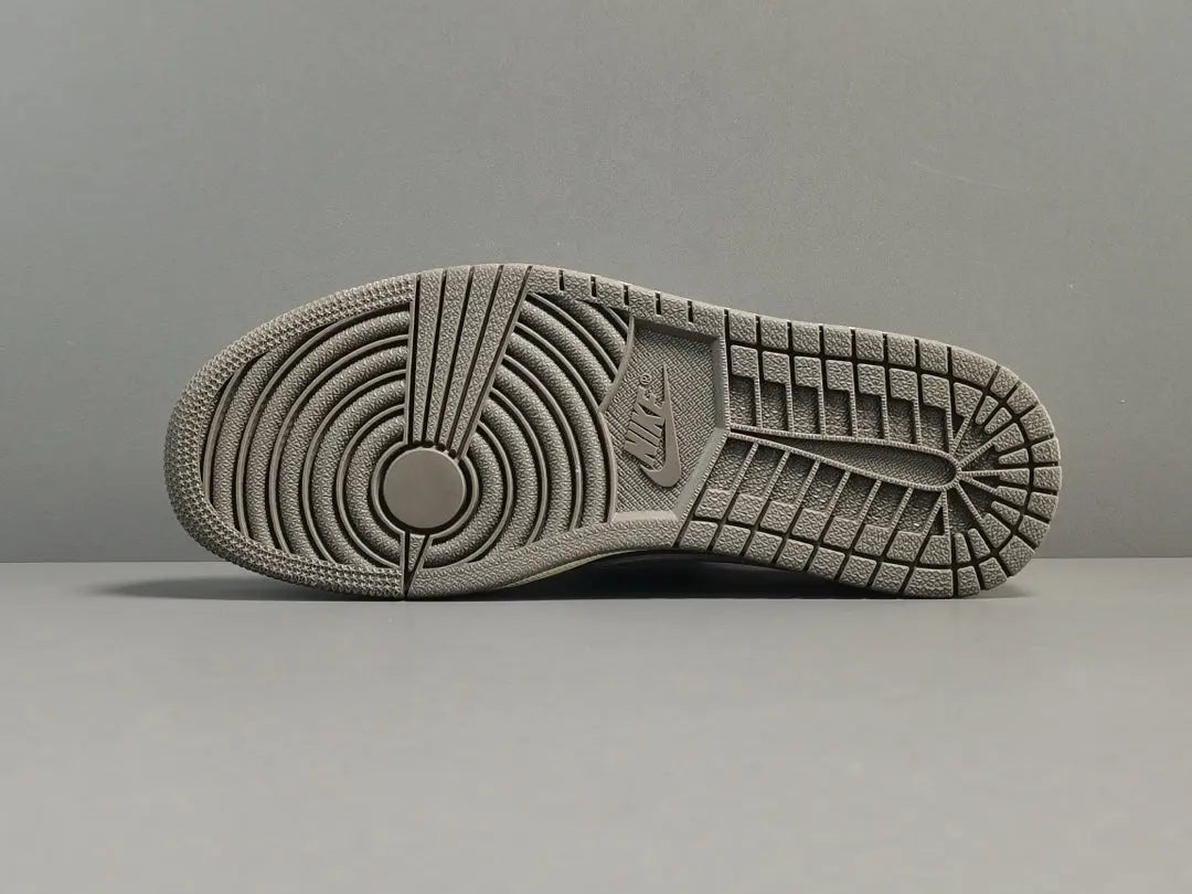 "Jordan 1 Low x Travis Scott Reverse Mocha – Mocha suede, reverse Swoosh, Cactus Jack branding, and vintage sail accents."