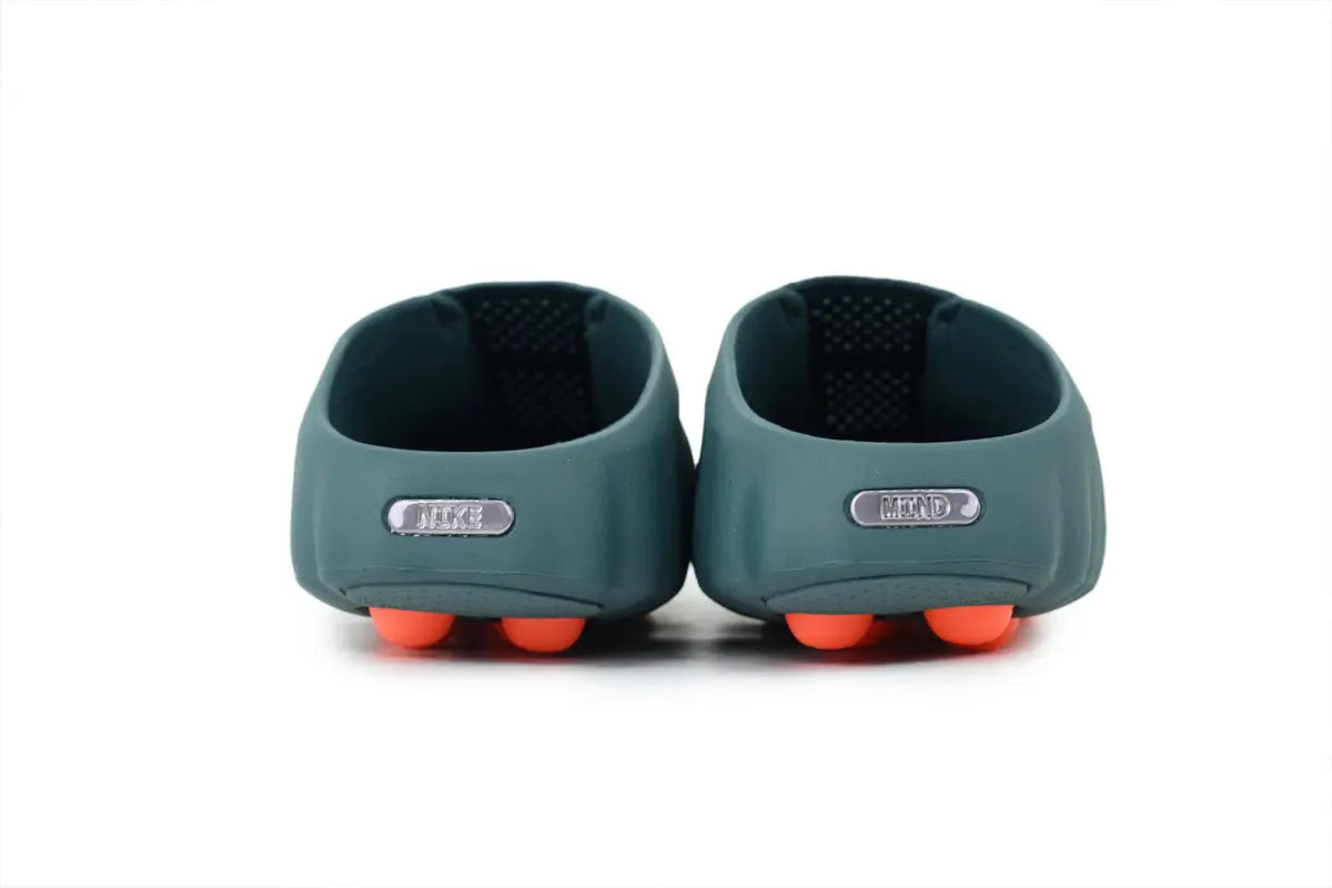 Back view of Nike Mind 001 Mineral Slate slides showing the heel design and durable construction