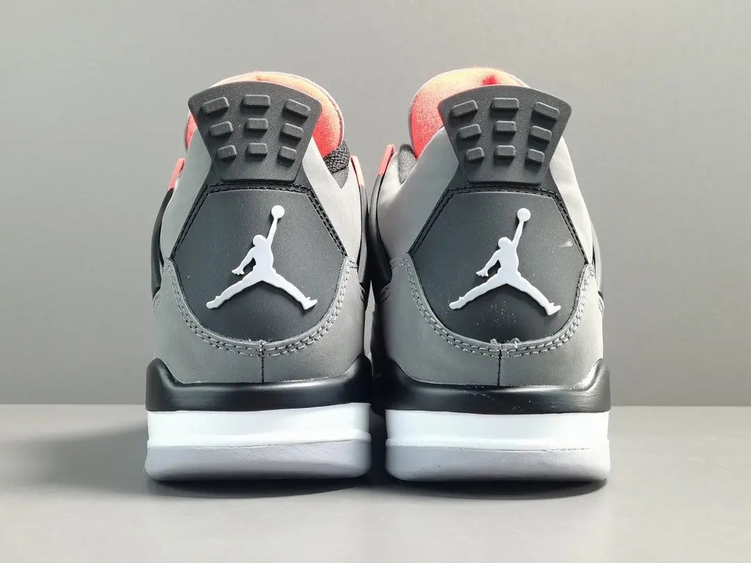 Air Jordan 4 Infrared sneakers black grey red accents iconic retro design
