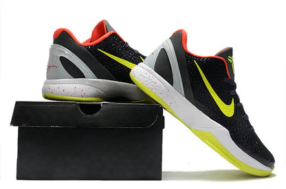 Nike Kobe 6 Supreme Chaos sneakers with bold yellow and purple low-top design.
