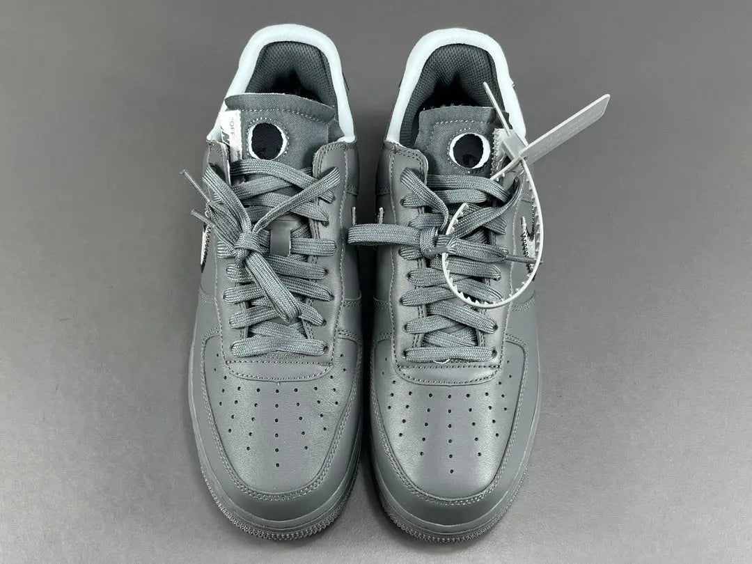 Nike Air Force 1 x Off-White custom grey sneaker with deconstructed design and zip tie
