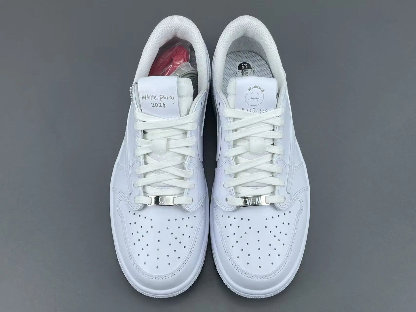 Air Jordan 1 Low Travis Scott White side view reverse Swoosh leather sneaker