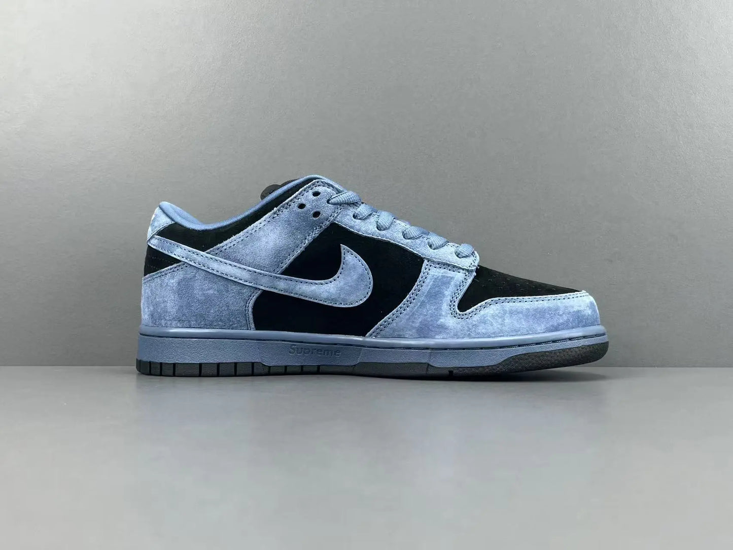 Nike SB Dunk Supreme 94 Ocean Fog low top sneaker side view grey white