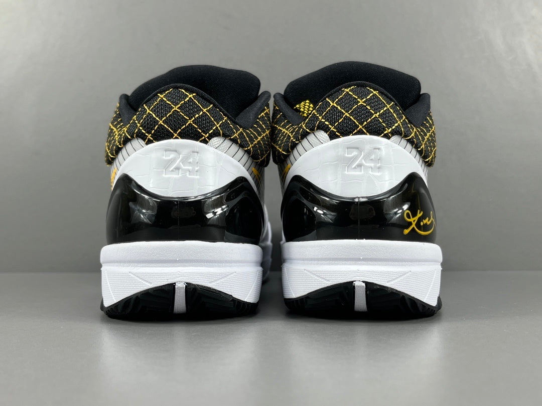 Nike Kobe 4 Protro White Black Del Sol basketball sneakers with accents
