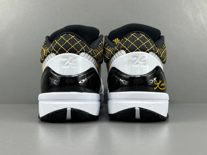 Nike Kobe 4 Protro White Black Del Sol basketball sneakers with accents
