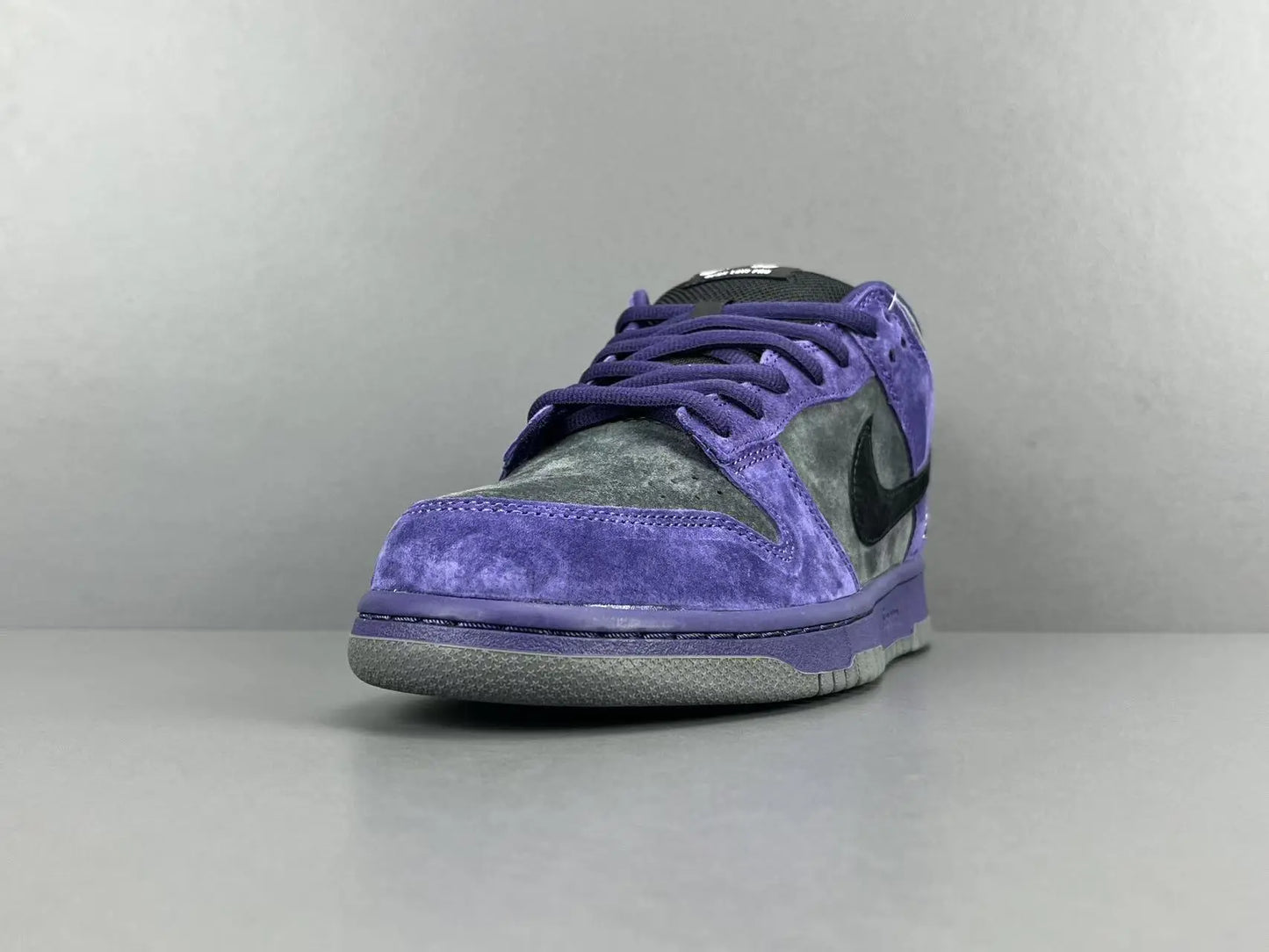 Nike SB Dunk Low x Supreme 94 Ink sneaker in deep blue leather
