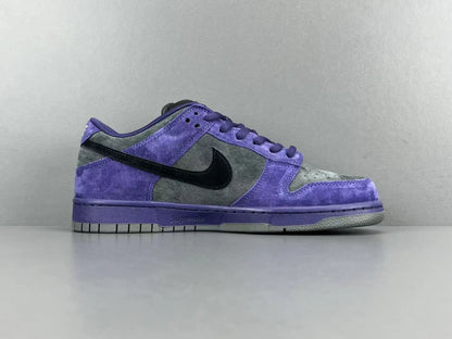 Nike SB Dunk Low x Supreme 94 Ink sneaker in deep blue leather
