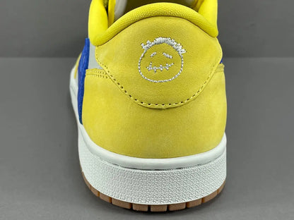 "Jordan 1 Low OG x Canary – low-top sneaker with premium leather upper, bright yellow and white colorway, and classic retro design."