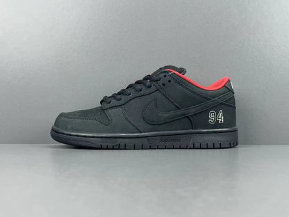 Nike SB Dunk Supreme 94 Black low top sneaker side view all black