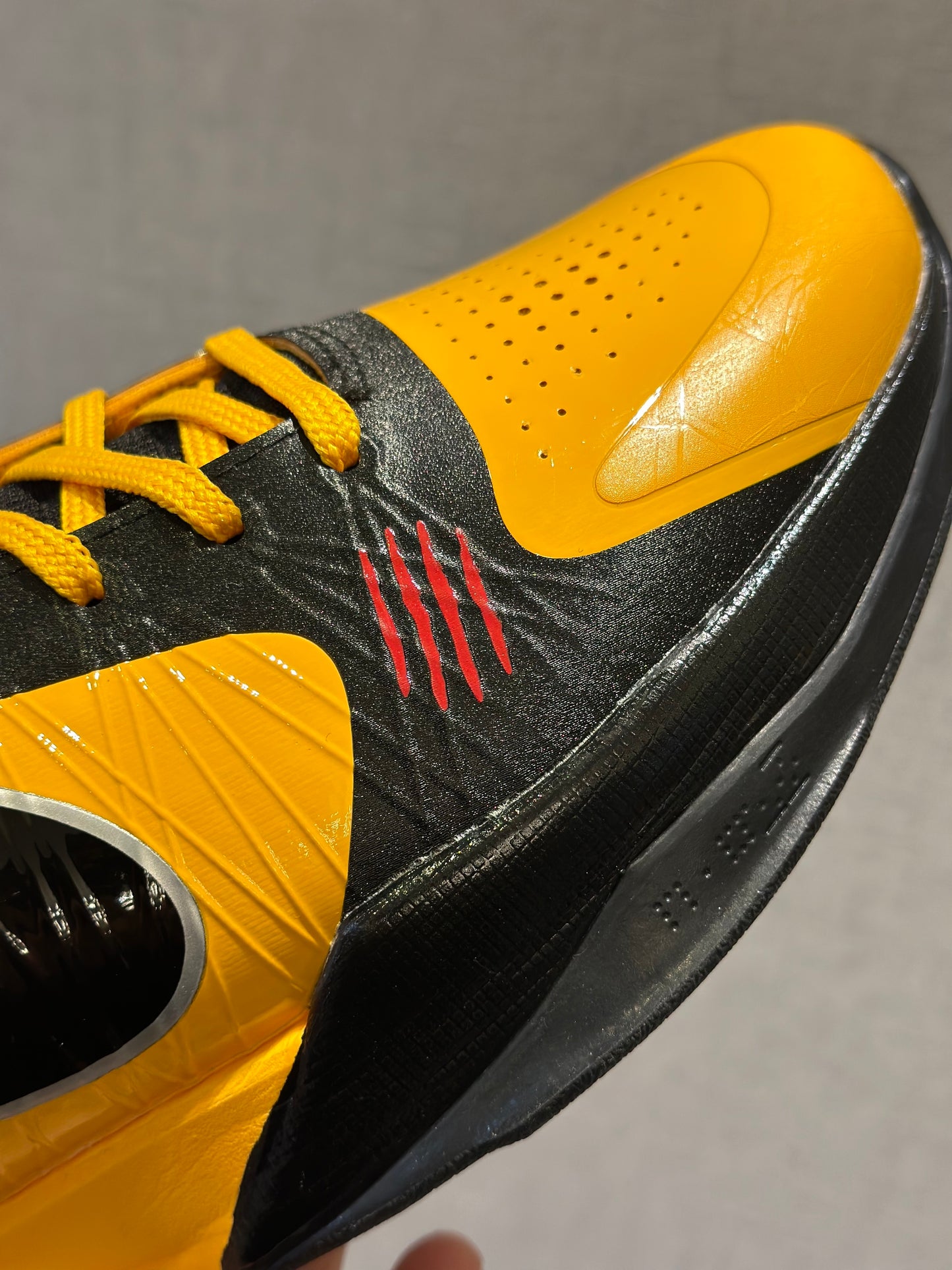Nike Kobe 5 Protro Bruce Lee basketball shoes in yellow and black colorway
