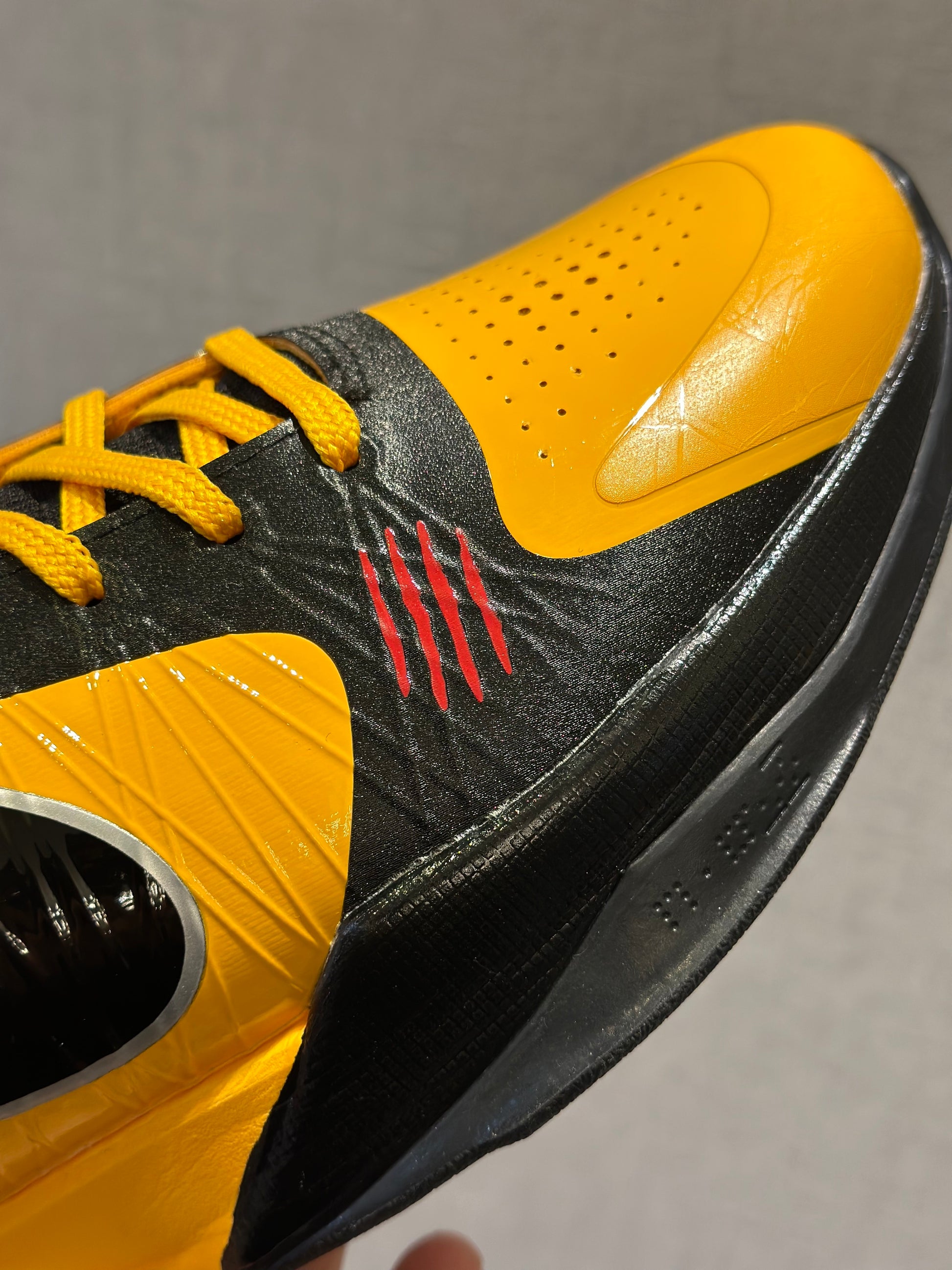 Nike Kobe 5 Protro Bruce Lee basketball shoes in yellow and black colorway
