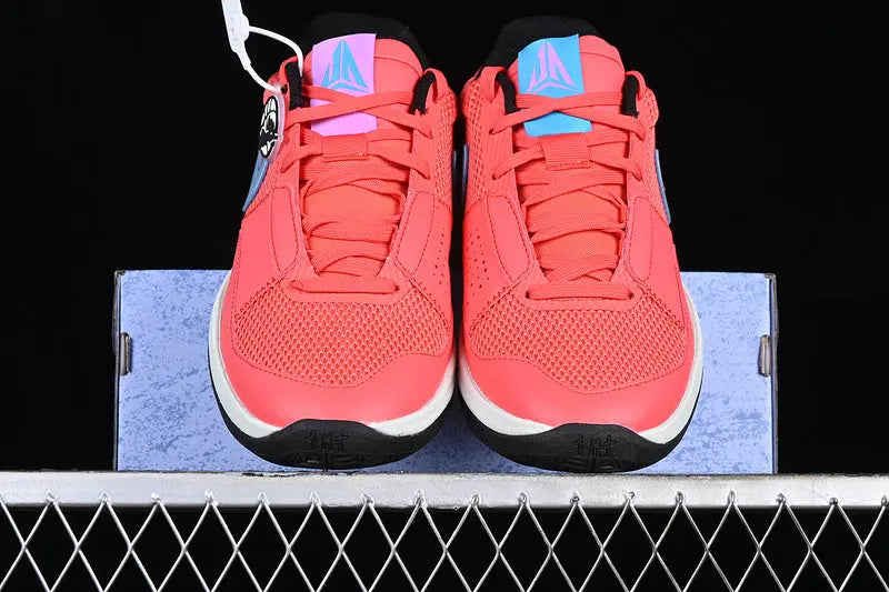 Nike Ja 1 x Fuel basketball sneakers in bold limited edition colorway, lightweight performance shoes with Zoom Air cushioning
