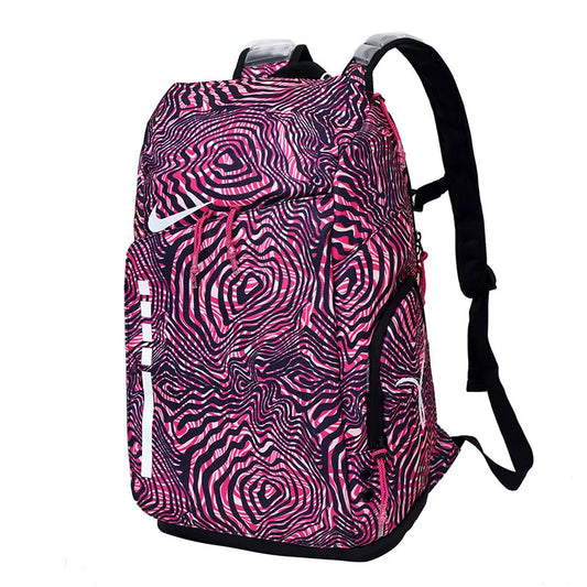 A Nike backpack featuring a vibrant pink and black wavy, hypnotic swirl pattern, with a white Nike swoosh logo on the front.