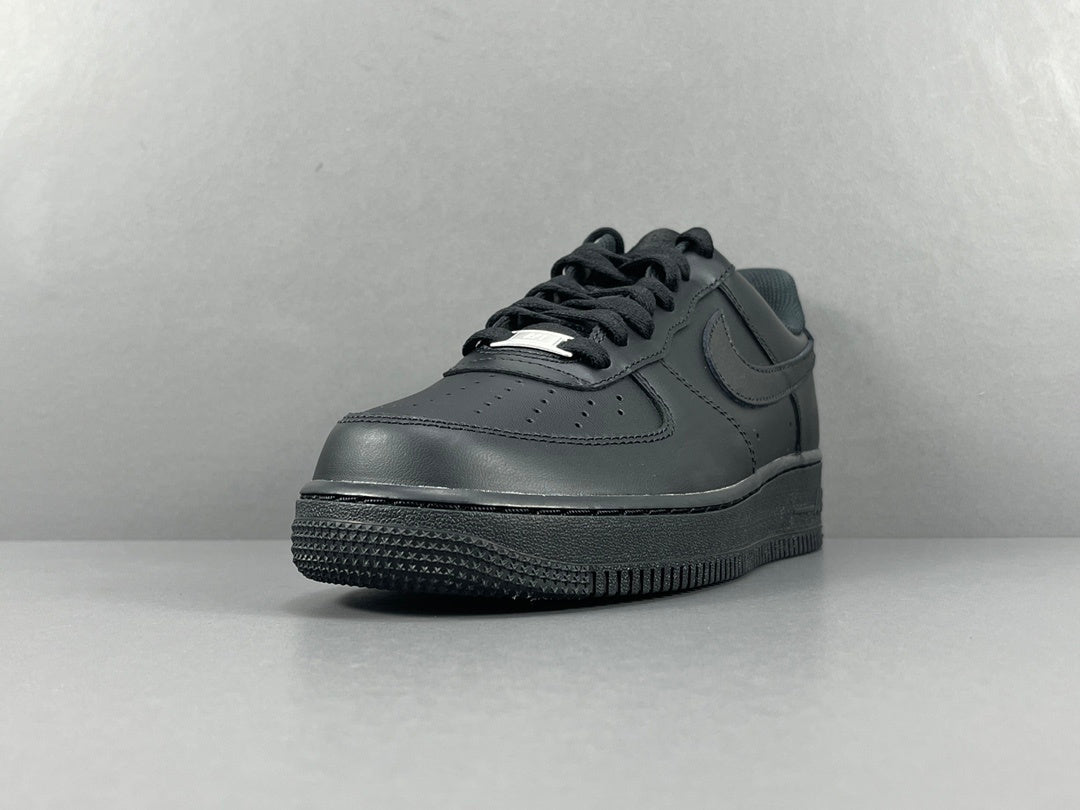 Nike Air Force 1 Black with classic silhouette, smooth leather upper, and all-black finish